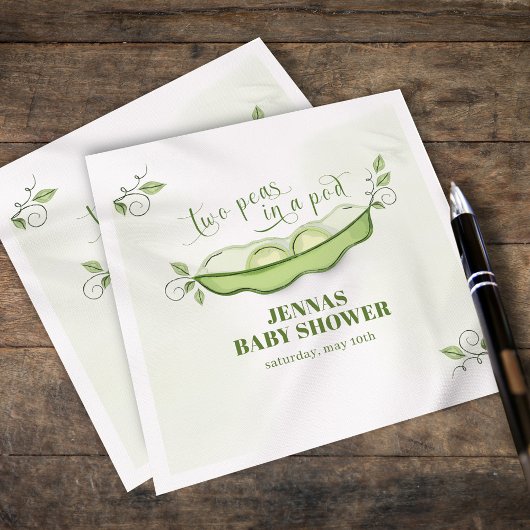 Neutrale grüne zwei Erbsen in einem Pod Serviette