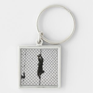 Neuzugänge, die ein Hindernis abschließen Schlüsselanhänger