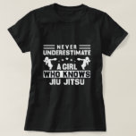 Never Underestimate a Girl Who Knows jiu jitsu T-Shirt<br><div class="desc">The funny quote design is perfect for a girl,  who loves jiu jitsu,  it can also be given as a birthday gift to your mom,  mother,  sister,  or grandma,  who loves Martial arts,  this quote “Never Underestimate a Girl Who Knows jiu jitsu”.</div>