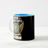 Never Underestimate The Power Of A Fleischman Zweifarbige Tasse (Vorderseite Links)