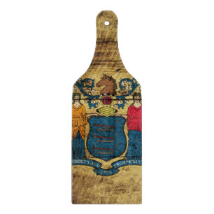 New-Jersey Staats-Flagge auf altem hölzernem Korn Schneidebrett