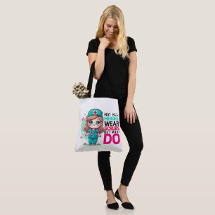 "Nicht alle Helden tragen Scrubs" Tote Bag Tasche