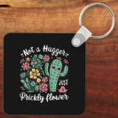 Nicht ein Hugger nur eine prickelnde Blume Niedlic Schlüsselanhänger (Rückseite)