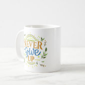 NIE AUFGEBEN KAFFEETASSE (Vorderseite Links)