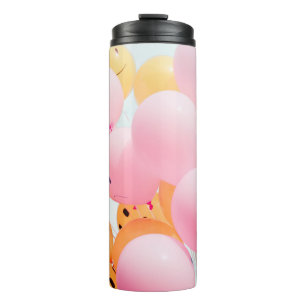 Niederwinkelballoons aus rosa und orangefarbenen F Thermosbecher