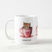 Niedlich Kitten in einem Teacup mit Herz Kaffeetasse (Links)