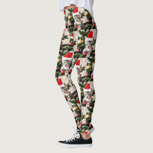 Niedlich Kitten spielt mit der Weihnachtsbaumkatze Leggings
