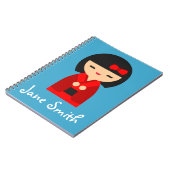 Niedlich orange Kokeshi Japanische Puppen Notizblock (Linke Seite)