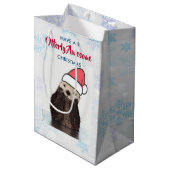 Niedlich Otter Tragen einer Weihnachtsmannmütze We Mittlere Geschenktüte (Vorderseite Schrägansicht)