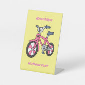 Niedlich-pink-Kinder Fahrrad Cartoon Abbildung Sockelschild (Vorderseite)