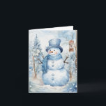 Niedlich Snowman Blue Hat Scarf Trees Birdhouse Bl Karte<br><div class="desc">Schneemann in blauer Hut und Schal umgeben von hübschen weißen Blume,  schneebedeckten Bäumen und einem Vogelhaus an diesem kalten Wintertag.</div>