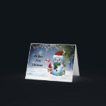 Niedlich Snowman First Christmas Card Feiertagskarte<br><div class="desc">Auf dieser 1. Weihnachtskarte steht ein schönes Bild eines Schneemanns mit Fingern und einem Hut des Weihnachtsmanns, der einen Bonbonstock hält. An der Vorderseite der Karte steht: "An eurem ersten Weihnachten". Im Inneren der Karte steht: "Möge die Magie und Staunen füllen Sie mit Freude! Frohe Weihnachten für dich". Eine niedliche...</div>
