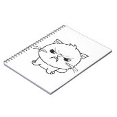 Niedlich zornige Katze, die sich herumhisst. Notizblock (Linke Seite)