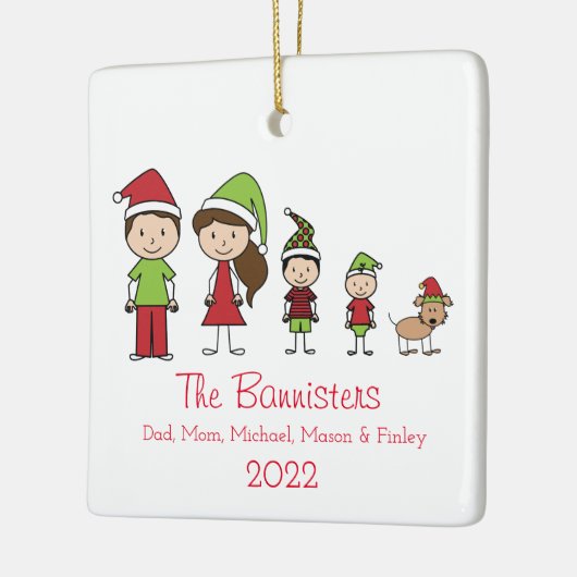 Niedliche 4-jährige Familie mit Weihnachtsschmuck (Links)