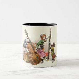 Niedliche anthropomorphe Kätzchen, die Musik Zweifarbige Tasse