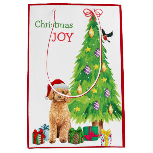 Niedliche Apricot Poodle Weihnachtsmannmütze und W Mittlere Geschenktüte