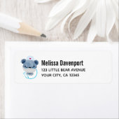 Niedliche Bärennahrung mit einer medizinischen Mas (Insitu)