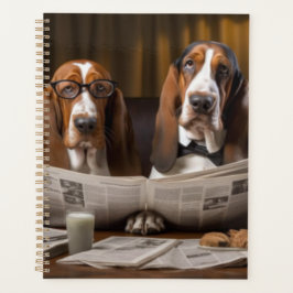 Niedliche Basset-Hunde beim Lesen einer Zeitung Planer