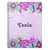 Niedliche Blume und Schmetterlinge auf lila Notizblock (Vorderseite)