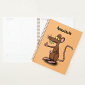 Niedliche braune Ratte hält Cartoon hoch Planer (Anzeige)