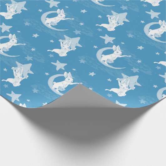 Niedliche Bunnies und Sterne auf blau Geschenkpapier (Ecke)