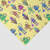 Niedliche, bunte Roboter auf gelbem Hintergrund Seidenpapier (Ausschnitt)