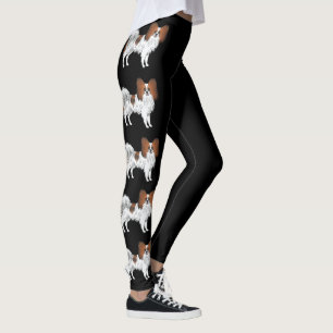 Niedliche Cartoon-Hunde auf schwarz Sable Papillon Leggings