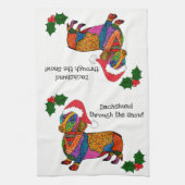 Niedliche Dackel durch das Schneeküchen Geschirrtuch (Vertikal)