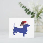 Niedliche Dackel in einer Weihnachtsmannmütze Feiertagspostkarte (Stehend Vorderseite)