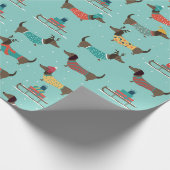 Niedliche Dackel und Schlitten mit Geschenken Geschenkpapier (Ecke)
