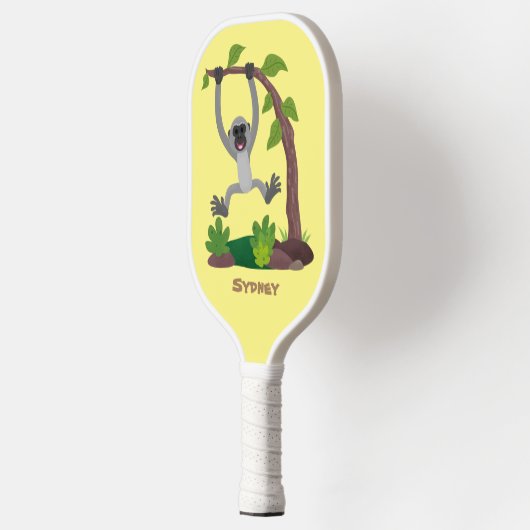 Niedliche Darstellung des Cartoon "glücklicher gib Pickleball Schläger (Links)