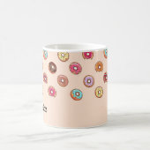 Niedliche dekorative Donuts auf rosa Kaffeetasse (Mittel)