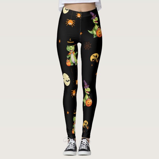 Niedliche Dinosaurier spielen Kürbistrick oder Lec Leggings (Vorderseite)