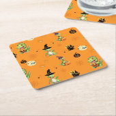 Niedliche Dinosaurier spielen Kürbistrick oder Lec Rechteckiger Pappuntersetzer (angewinkelt)