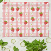 Niedliche Erdbeere und Blume auf einem rosa Gingha Geschirrtuch (Gefaltet)