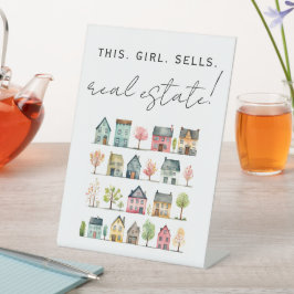 Niedliche farbenfrohe Häuser Dieses Mädchen verkau Sockelschild