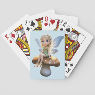 Niedliche Fee auf einem Pilz, der Karten spielt Spielkarten