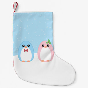 Niedliche Feiertagpenguin-Paare Kleiner Weihnachtsstrumpf