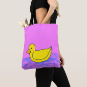 niedliche gelbe Ente auf rosa Tasche (Von Nahem)