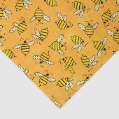 Niedliche gelbe Hummeln auf orangefarbenem Muster Seidenpapier (Ausschnitt)