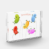 Niedliche glückliche Jellybohnen springende Cartoo Fotoblock (Links)