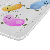 Niedliche glückliche Jellybohnen springende Cartoo Schneidebrett (Ecke)