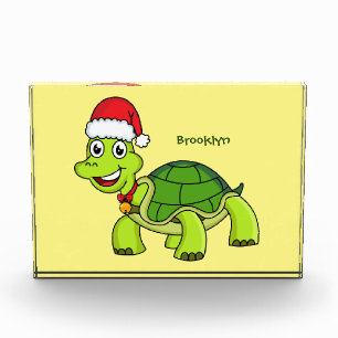 Niedliche glückliche Schildkröte mit Weihnachtsman Fotoblock