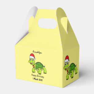 Niedliche glückliche Schildkröte mit Weihnachtsman Geschenkschachtel