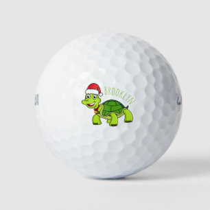 Niedliche glückliche Schildkröte mit Weihnachtsman Golfball