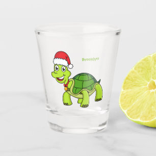 Niedliche glückliche Schildkröte mit Weihnachtsman Schnapsglas