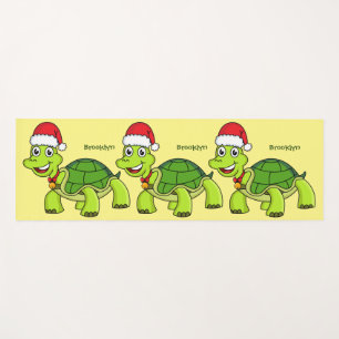 Niedliche glückliche Schildkröte mit Weihnachtsman Yogamatte