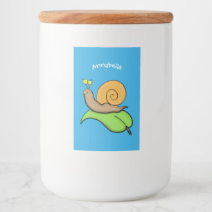 Niedliche, glückliche Schnecke auf einer Cartoon-I Lebensmitteletikett