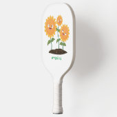 Niedliche glückliche Sonnenblumen lächelnd Cartoon Pickleball Schläger (Links)