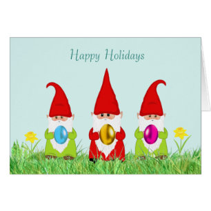 Niedliche Gnome, die Ostereier halten